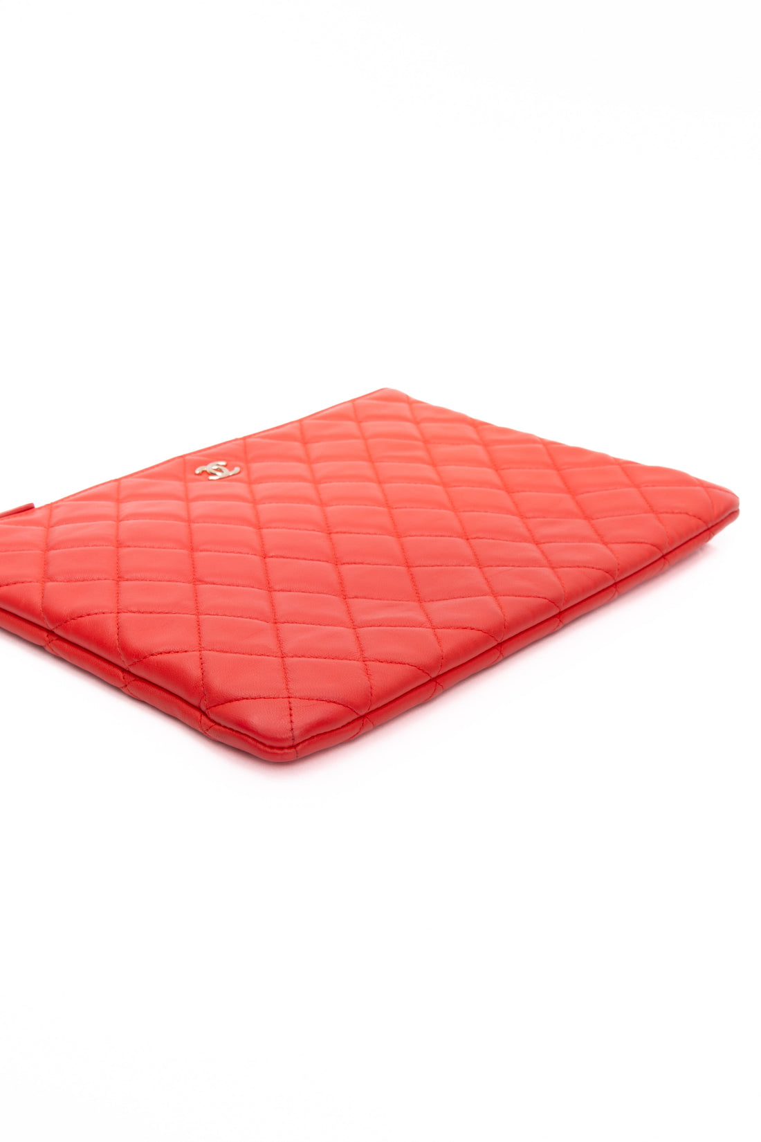 CHANEL Coral Lambskin Quilted Medium O Case Clutch - Handbags