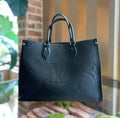 LOUIS VUITTON Onthego MM Black Empreinte Giant Monogram Tote Bag - Tote