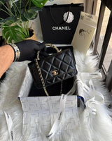 Chanel 24B WOC Top Handle in Black Shiny Lambskin GHW