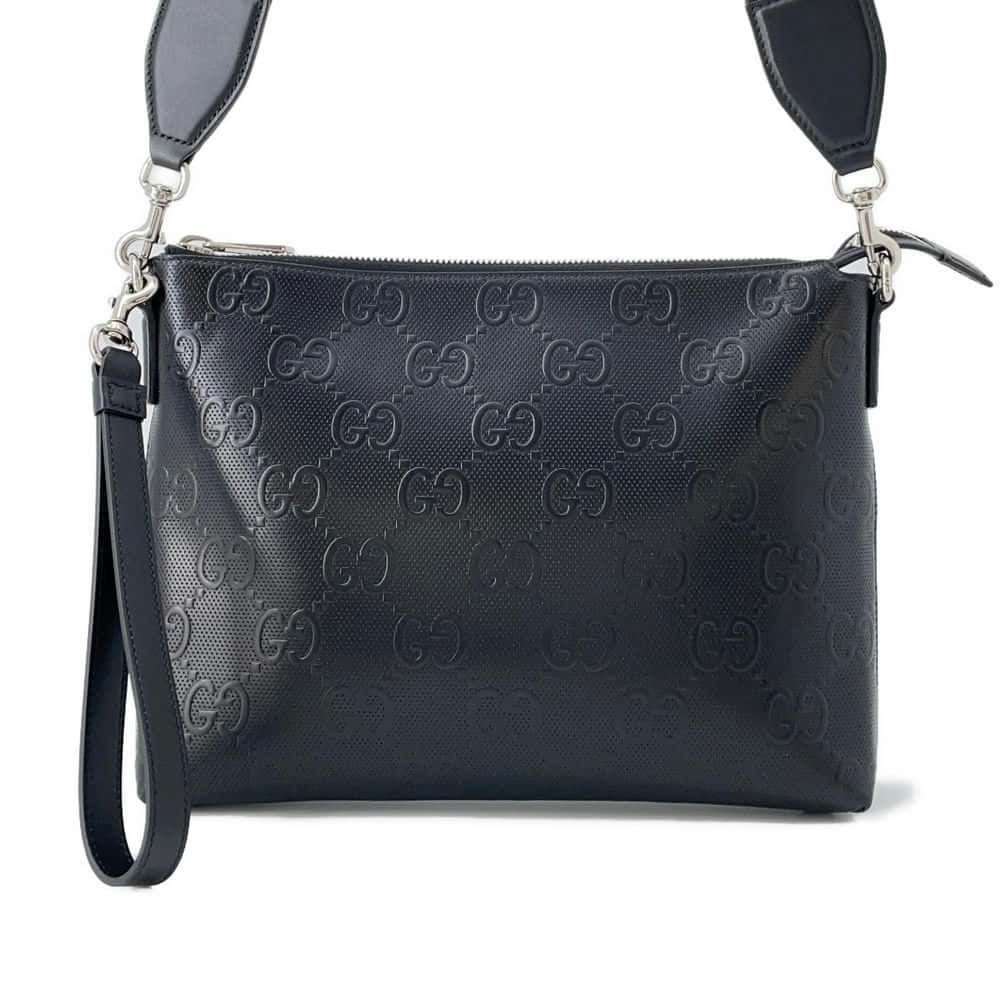 GUCCI GG-embossed messenger bag Black 696009 Leather - Bags
