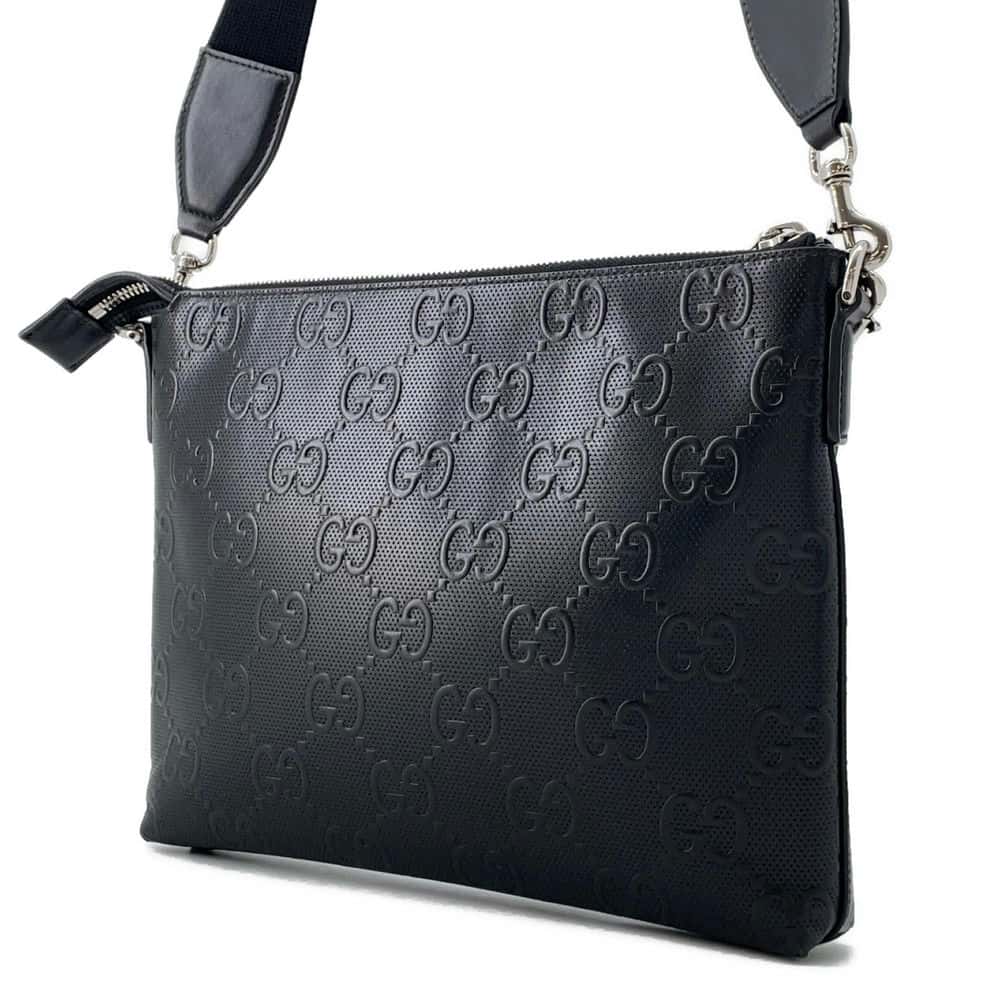 GUCCI GG-embossed messenger bag Black 696009 Leather - Bags