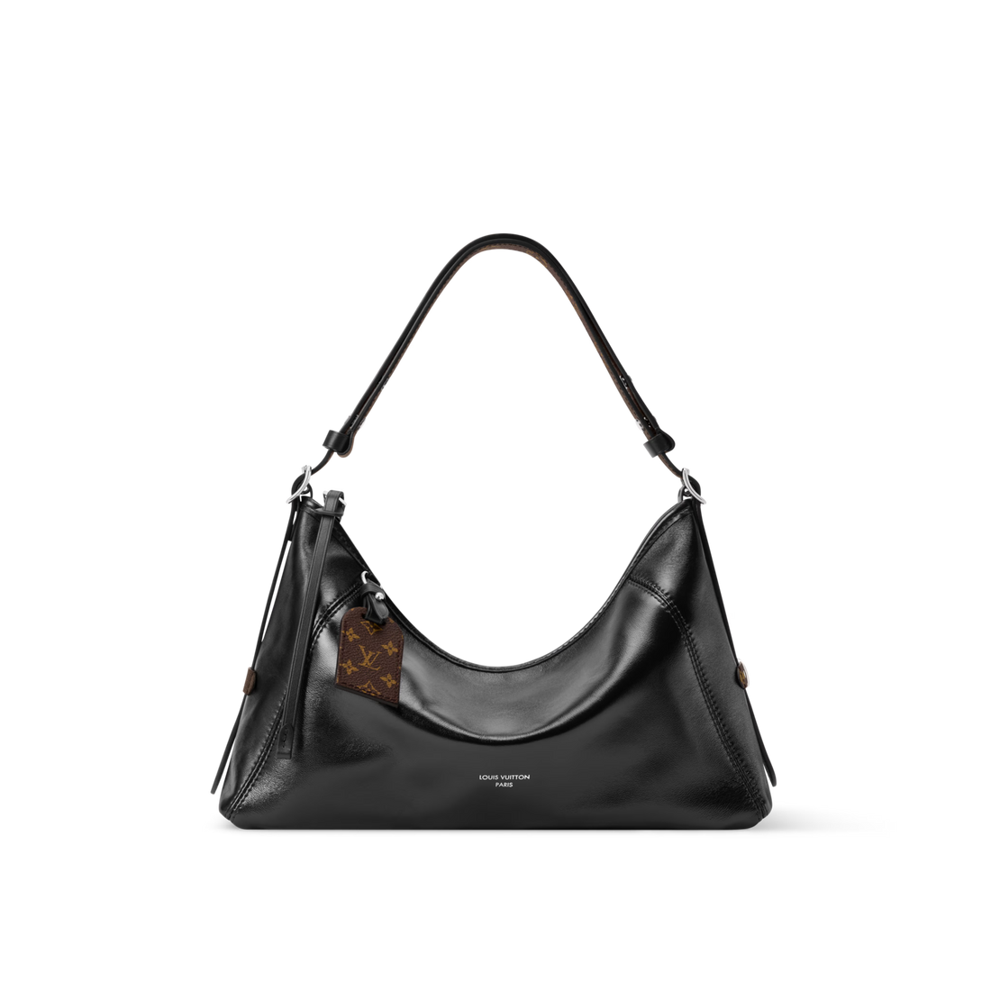 The LV Vibe collection presents this Carryall East West, which artfully blends heritage details with a contemporary silhouette. It is made from supple lamb leather with signature Monogram trims, including a name tag that pays tribute to the House’s archival trunks. Sized to fit everyday essentials, it has a removable strap and can be worn crossbody, over one shoulder or carried by hand.