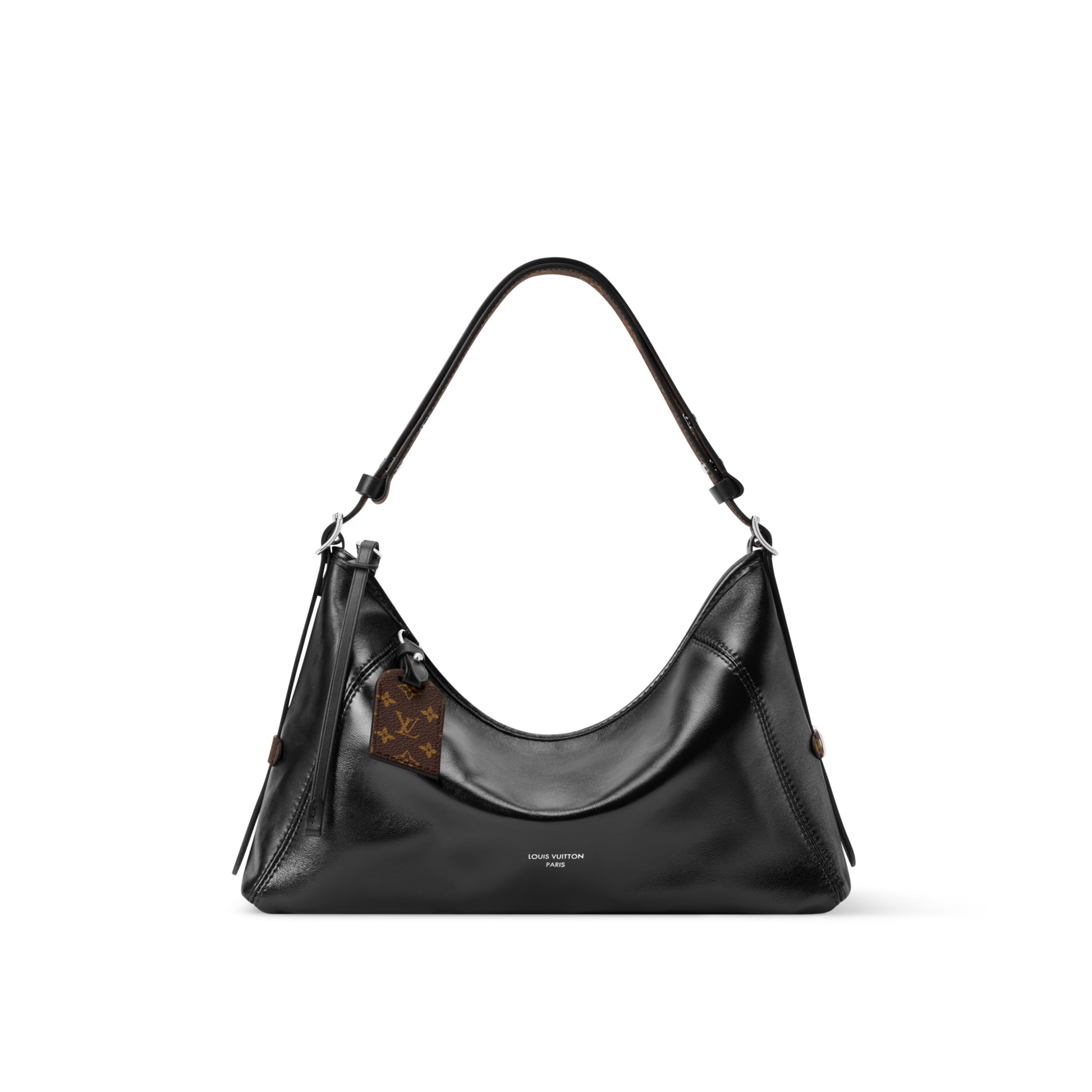 The LV Vibe collection presents this Carryall East West, which artfully blends heritage details with a contemporary silhouette. It is made from supple lamb leather with signature Monogram trims, including a name tag that pays tribute to the House’s archival trunks. Sized to fit everyday essentials, it has a removable strap and can be worn crossbody, over one shoulder or carried by hand.
