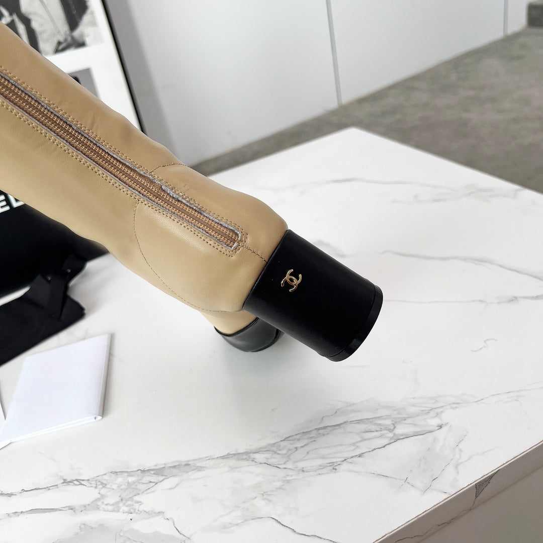 CC 25 high boots beige black sheepskin 459456