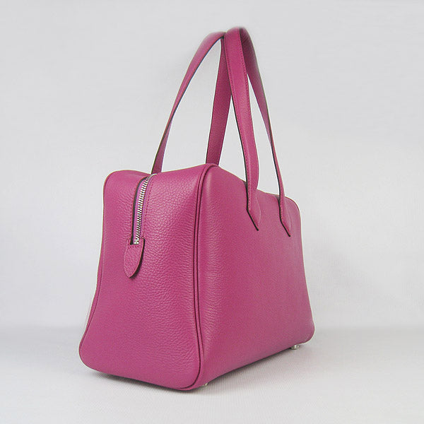 Luxury Hermes Togo leather handbag peach | Studio Nafay