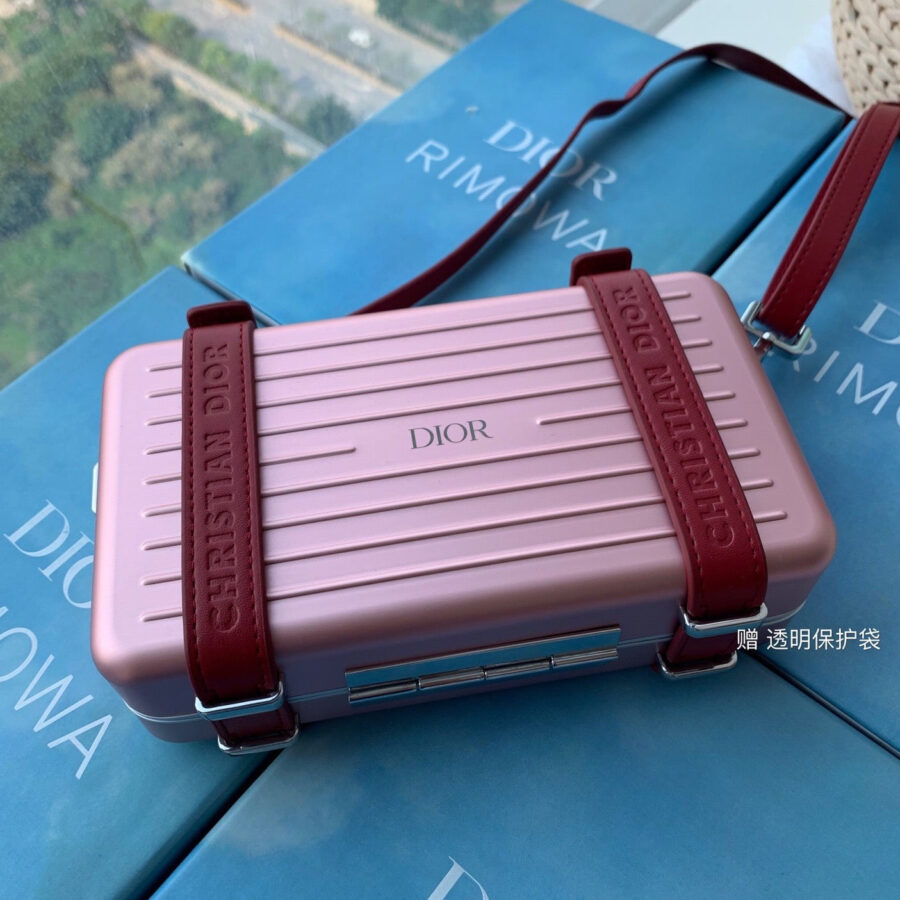 RIMOWA 20 CASE BAG IN LIGHT PINK ALUMINUM MAGNESIUM | Studio Nafay