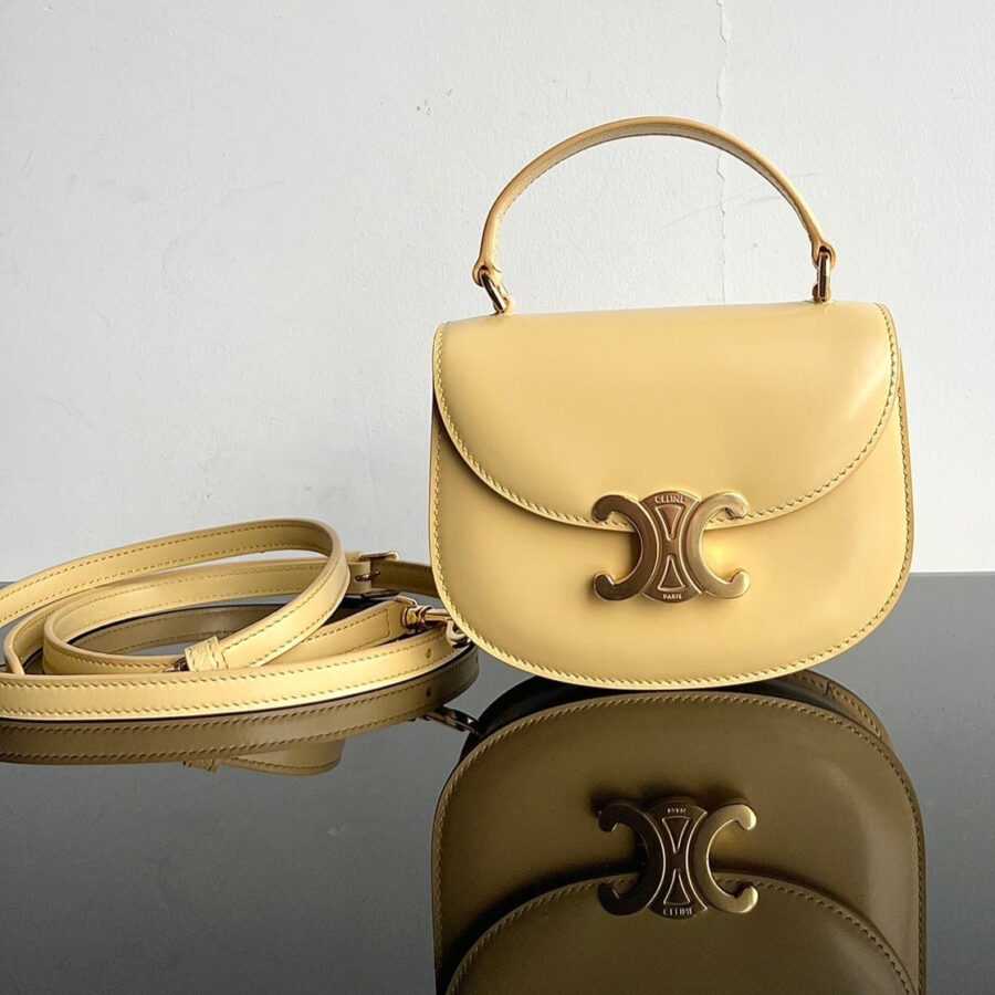 TRIOMPHE SHINY CALFSKIN HANDBAG 18 YELLOW PASTEL | Studio Nafay