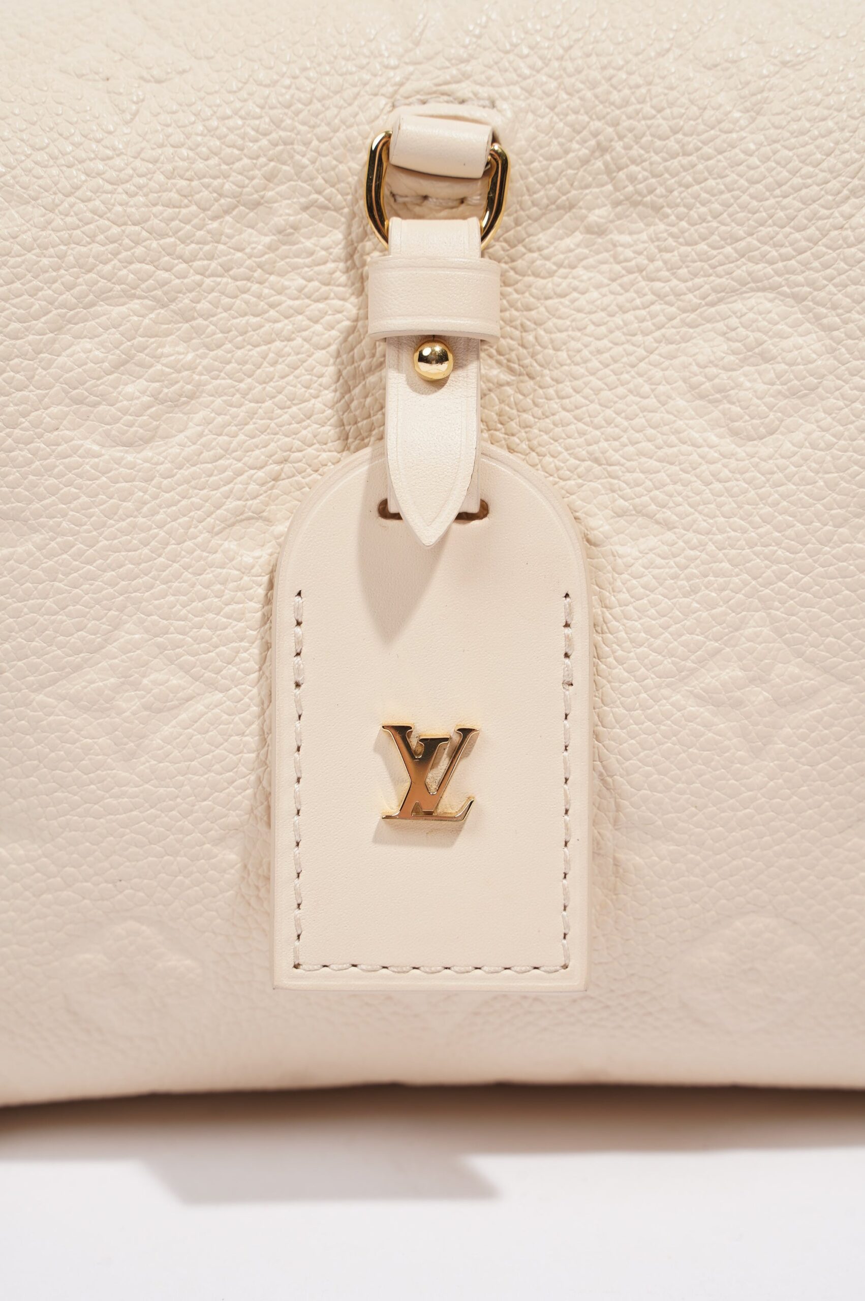 LOUIS VUITTON MALLE SOUPLE EMPREINTE EMBOSSED WHITE LEATHER