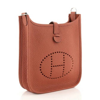 HERMÈS CLEMENCE MINI EVELYN TPM CROSSBODY BAG IN ROUGE PIVOINE | Studio Nafay