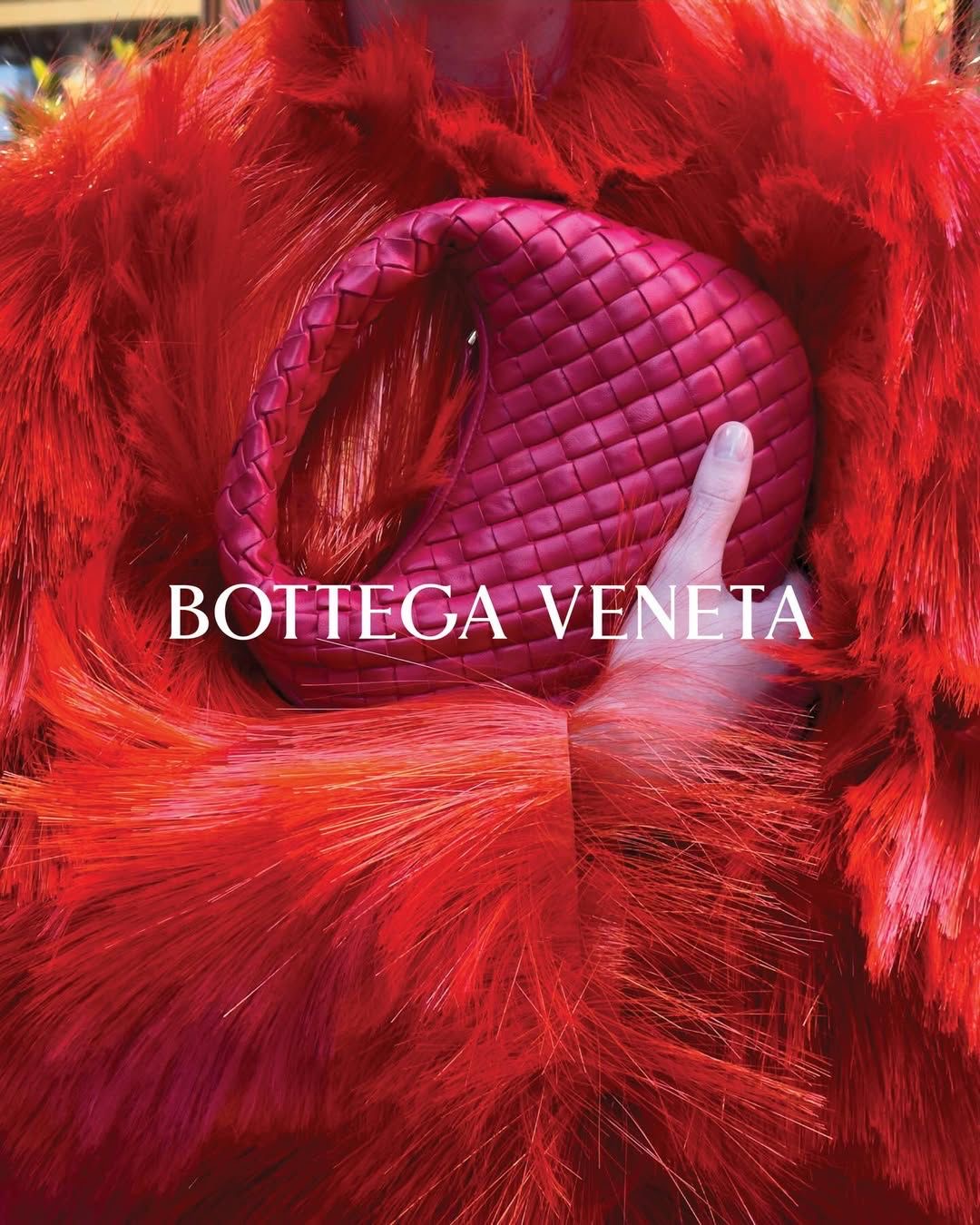 Bottega Veneta red woven bag editorial