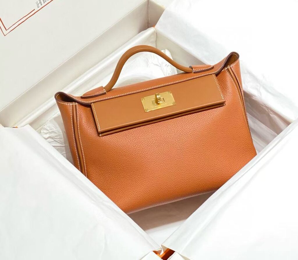 HM 24/24 Mini Bag Gold Evercolor Leather Gold Hardware | Studio Nafay