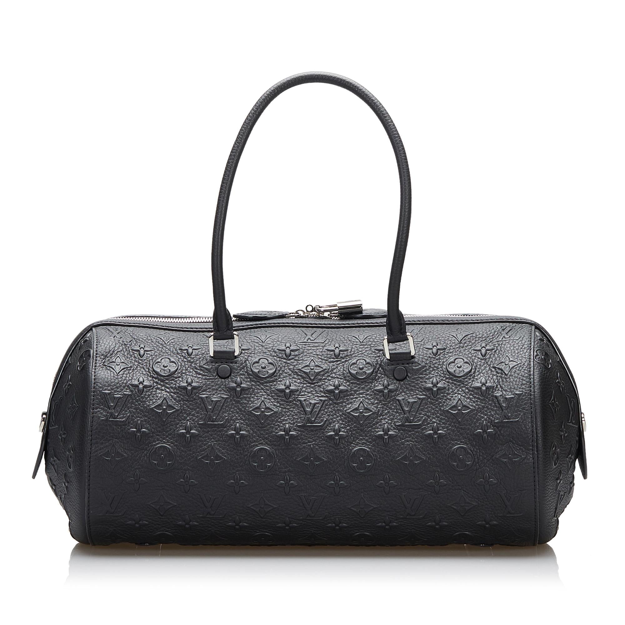Louis Vuitton Monogram Revelation Neo Papillon GM