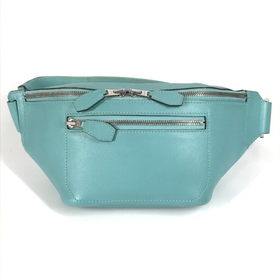 HERMES Sling bag Evercolor blue Shoulder Bag City slide cross PM | Studio Nafay