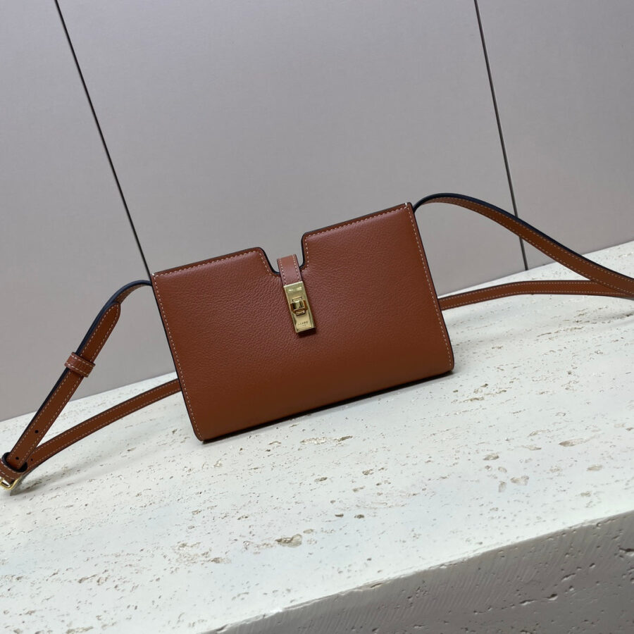 MINI 18 STRAP POCHETTE IN BRONZE BROWNN SUPPLE CALFSKIN | Studio Nafay