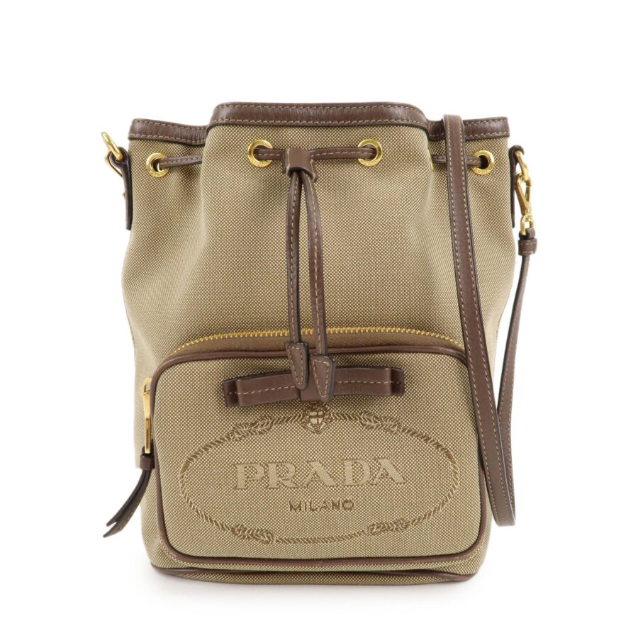 PRADA Logo Jacquard Leather Drawstring Shoulder Bag Beige | Studio Nafay