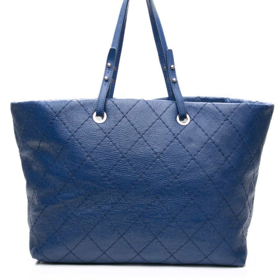 CHANEL Blue Quilted Glazed Leather On-The-Road XL Tote Bag | Studio Nafay