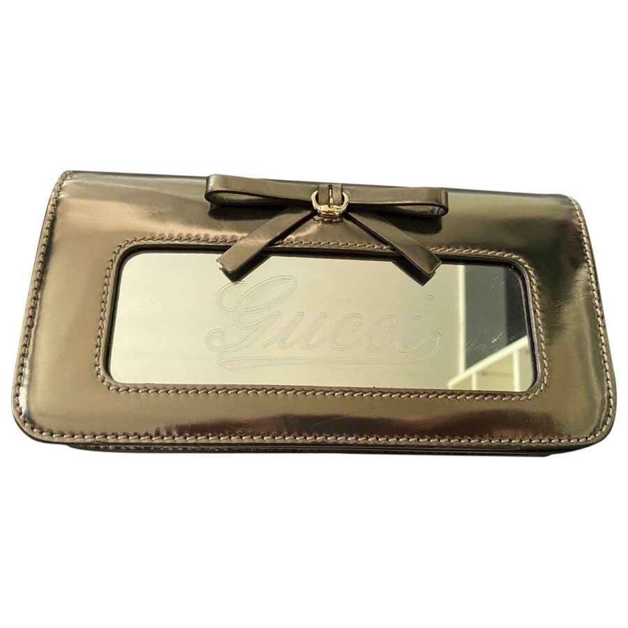Gucci brown patent leather clutch bag | Studio Nafay