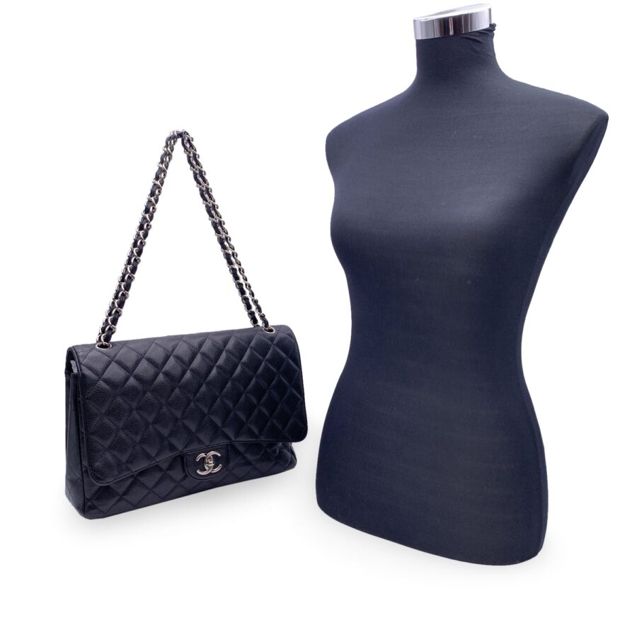 CHANEL Black Quilted Caviar Maxi Timeless Classic 2 55 Double Flap Bag | Studio Nafay