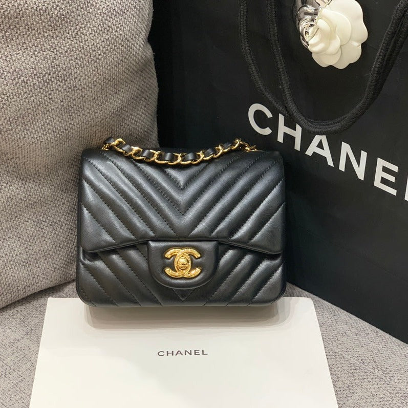 MINI SQUARE FLAP BAG 17CM BLACK LAMBSKIN CHEVRON GOLD HARDWARE | Studio Nafay