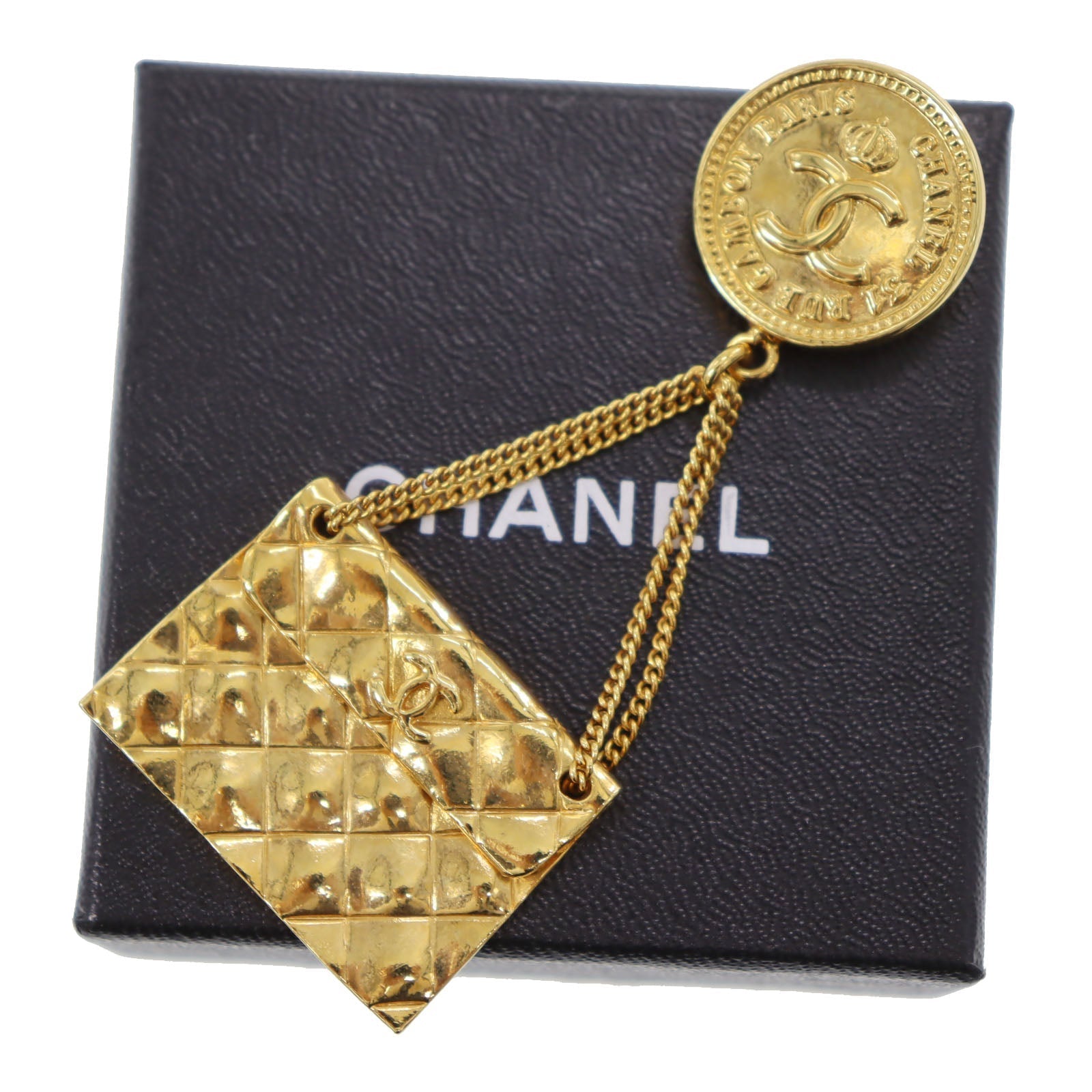 Chanel Gold Medallion Swing Handbag