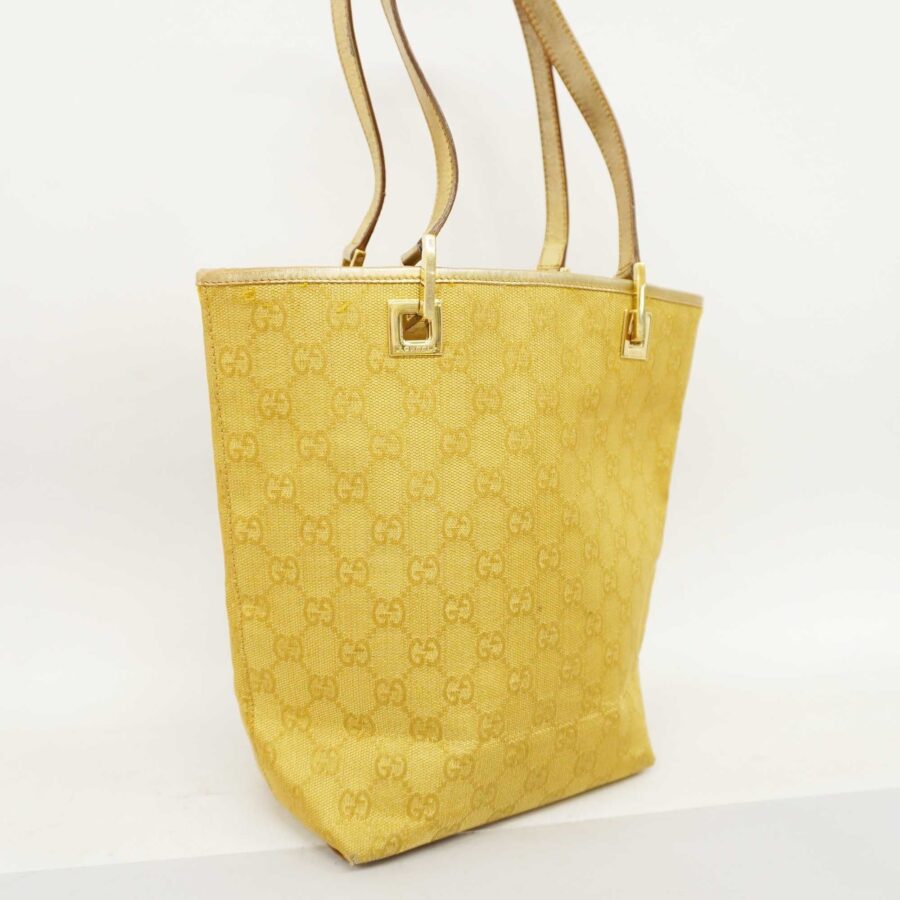 GUCCIAuth 002 1099 Women's GG Canvas Tote Bag Gold | Studio Nafay
