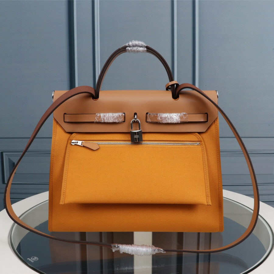 HM HERBAG ZIP 31 CARROT AND COPPER CANVAS | Studio Nafay