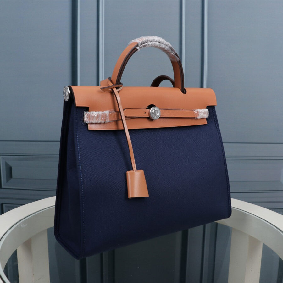 HM HERBAG ZIP 31 NAVY AND BRONZE CANVAS | Studio Nafay