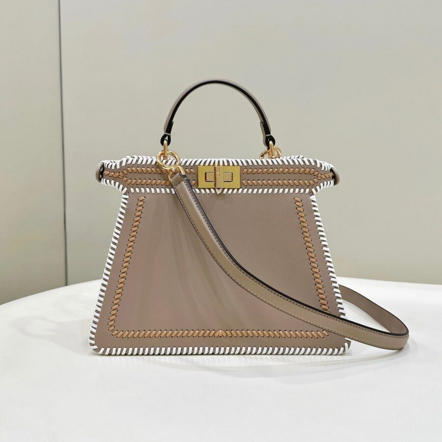 PEEKABOO ISEEU 27 IN MEDIUM BROWN INTERLACED CALFSKIN GOLD HARDWARE | Studio Nafay