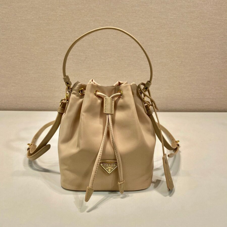 BUCKET BAG 19 IN BEIGE RE-NYLON AND SAFFIANO LEATHER HANDLE | Studio Nafay