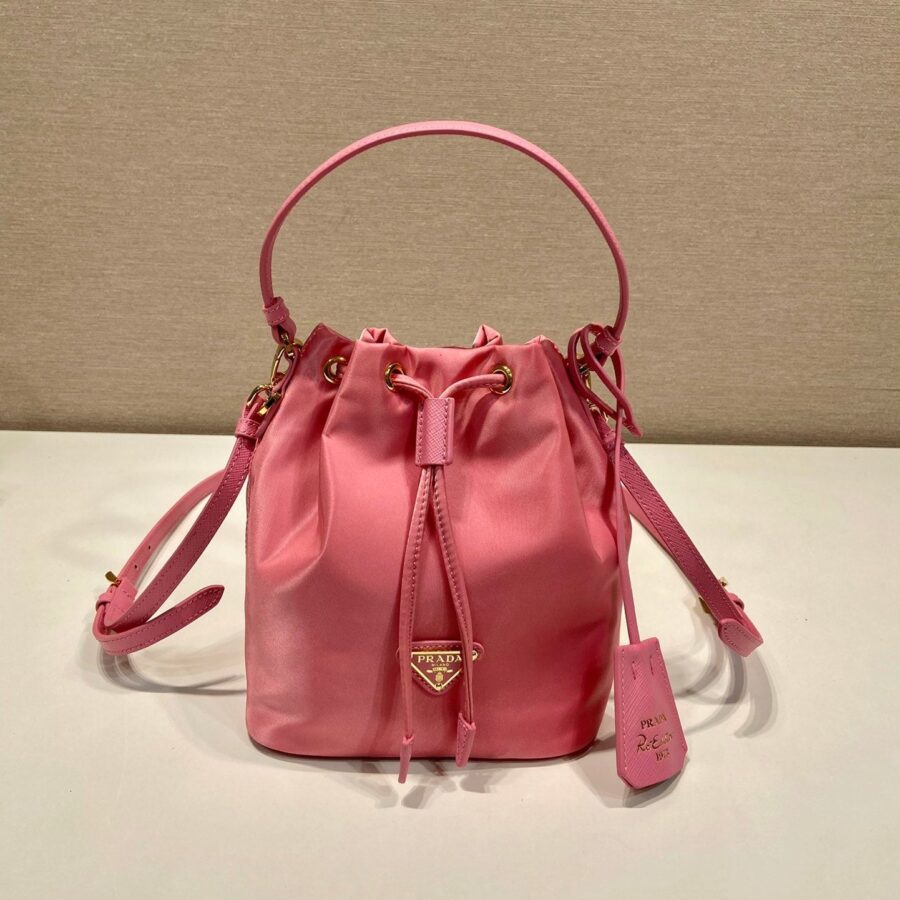 BUCKET BAG 19 IN CANDY PINK RE-NYLON AND SAFFIANO LEATHER HANDLE | Studio Nafay