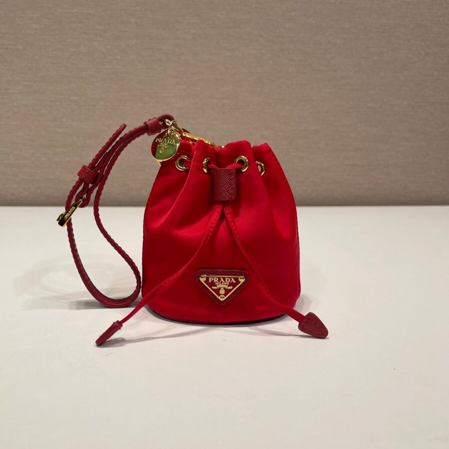 MINI BUCKET BAG 10 IN RED RE-NYLON AND SAFFIANO LEATHER STRAP | Studio Nafay