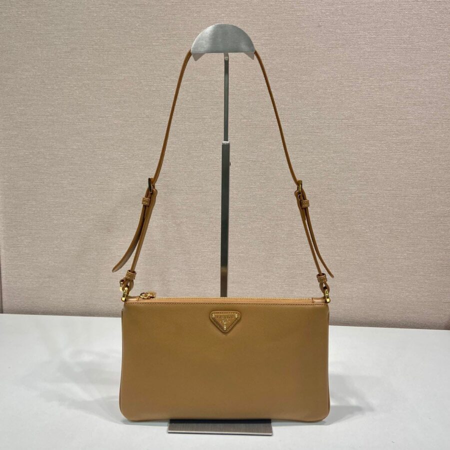 TRIANGLE LOGO SHOULDER BAG 24 IN PEANUT BROWN SMOOTH CALFSKIN | Studio Nafay