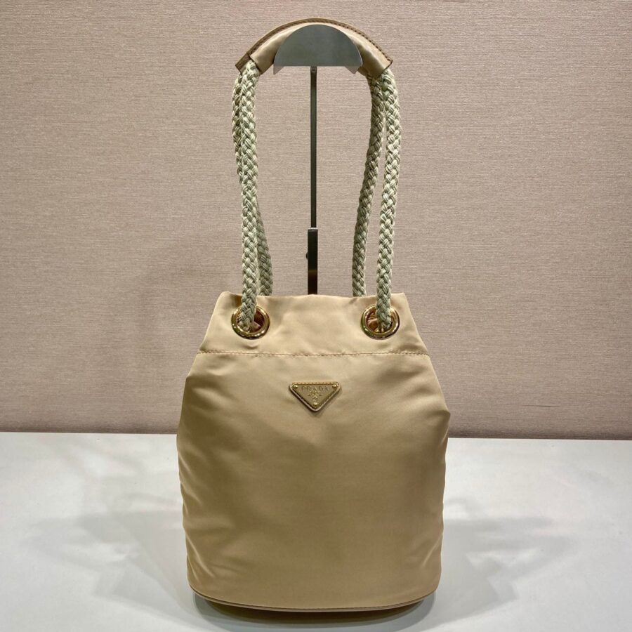 BUCKET BAG 28 IN BEIGE RE-NYLON GOLD LOGO | Studio Nafay