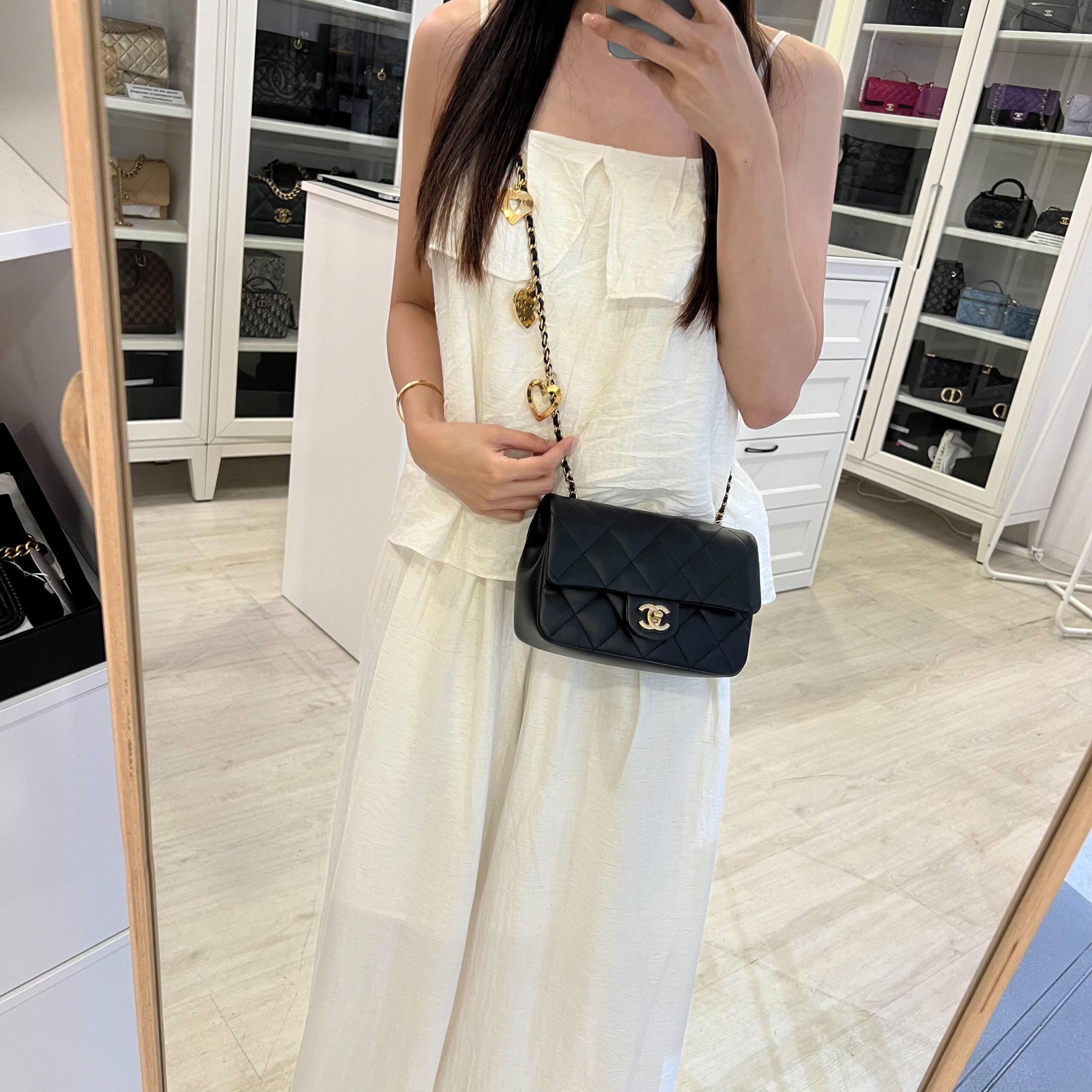 Chanel 22B Small Flap Bag with Heart Charms in Black Lambskin and AGHW
