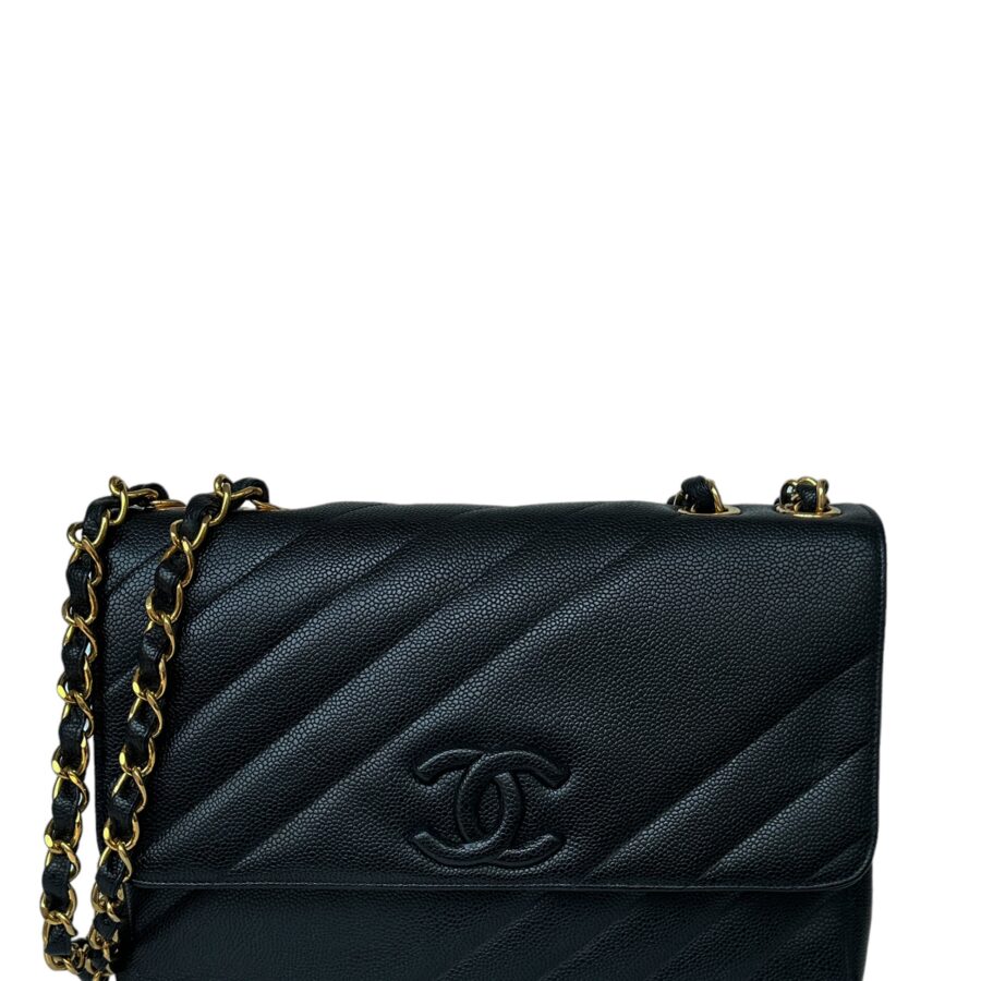 Chanel 1990s Black Caviar Leather Diagonal Quilted CC Flap Bag | Studio Nafay