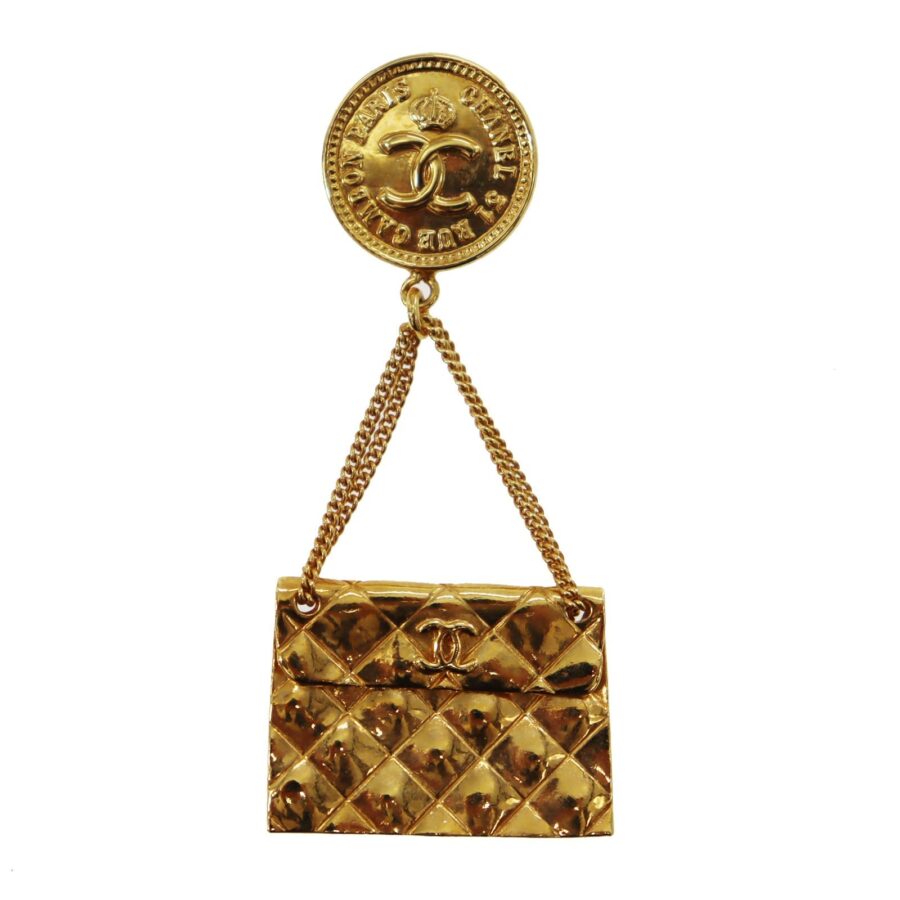 Chanel Gold Medallion Swing Handbag | Studio Nafay