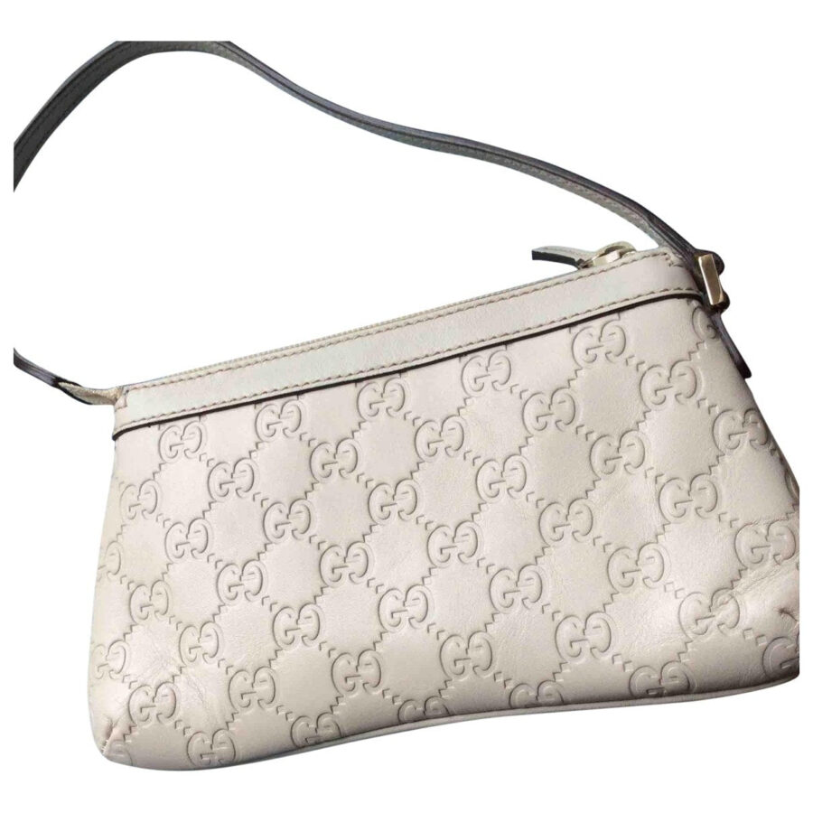 Gucci beige leather clutch bag | Studio Nafay