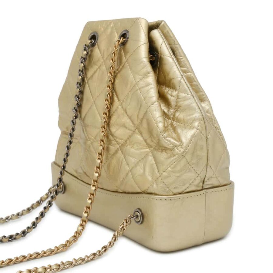 CHANEL Gabrielle de CHANEL Backpack Gold Leather Size Small | Studio Nafay
