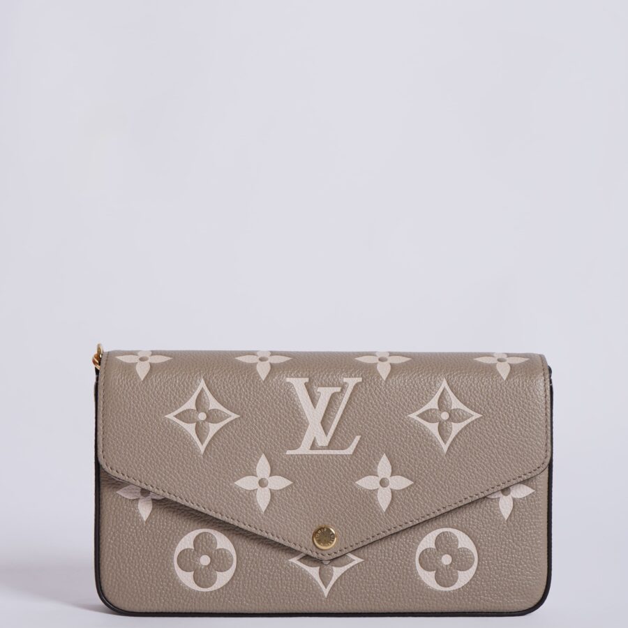 Louis vuitton Monogram Empreinte pochette felicie in creme | Studio Nafay