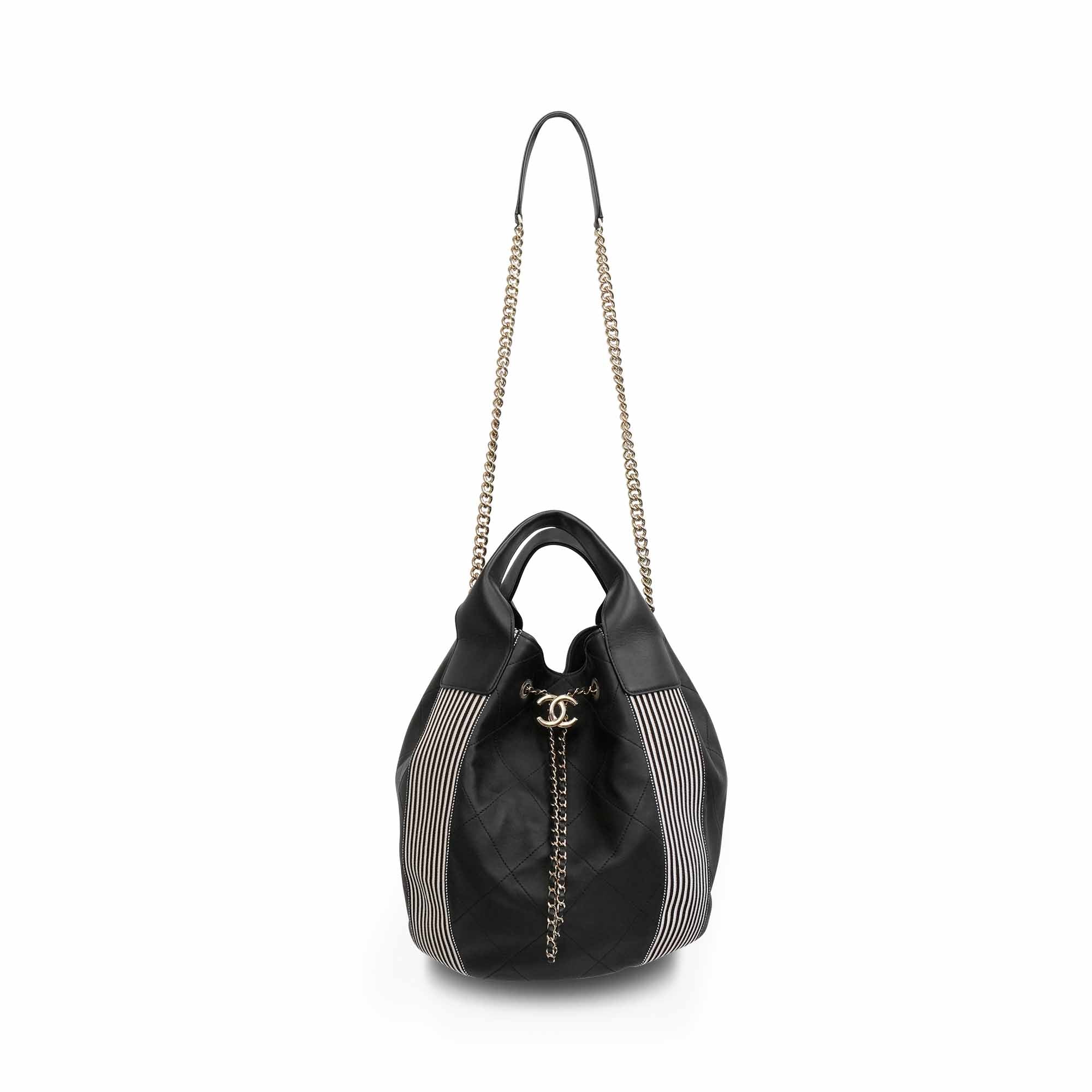 CHANEL Black/White Bucket Handbags
