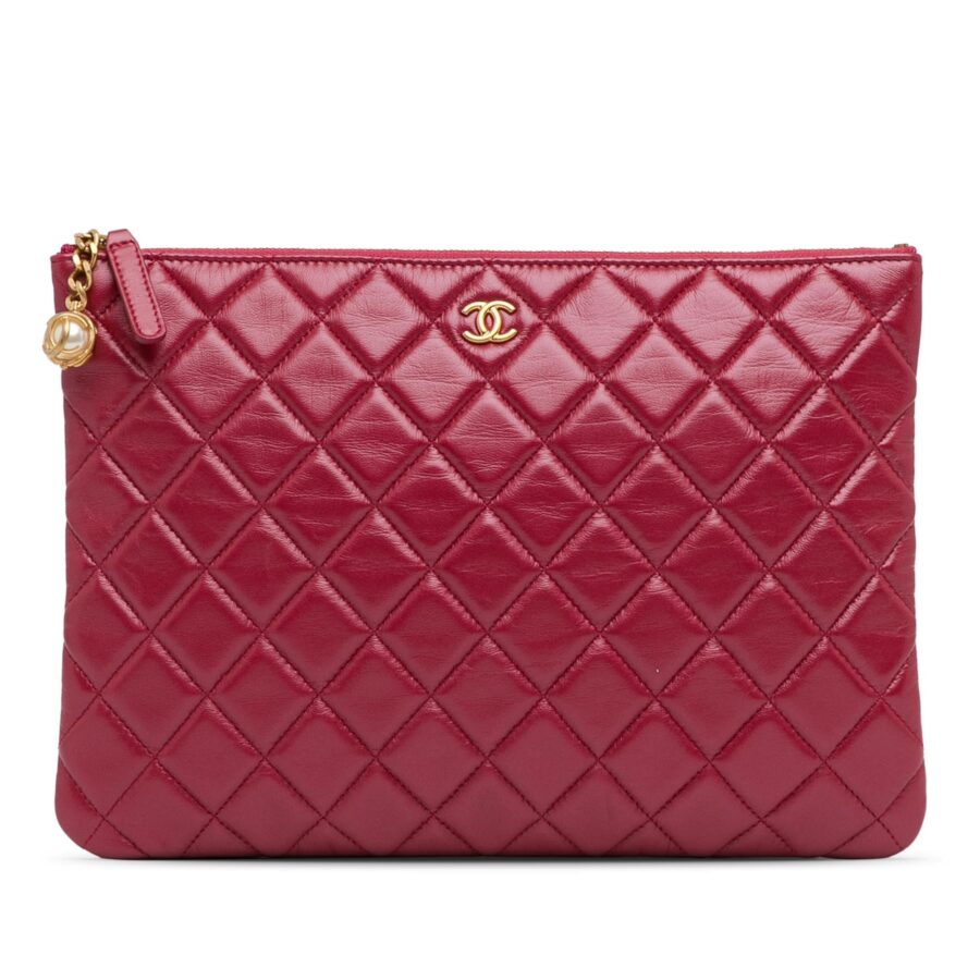 Chanel Medium Quilted Lambskin O Case Clutch | Studio Nafay