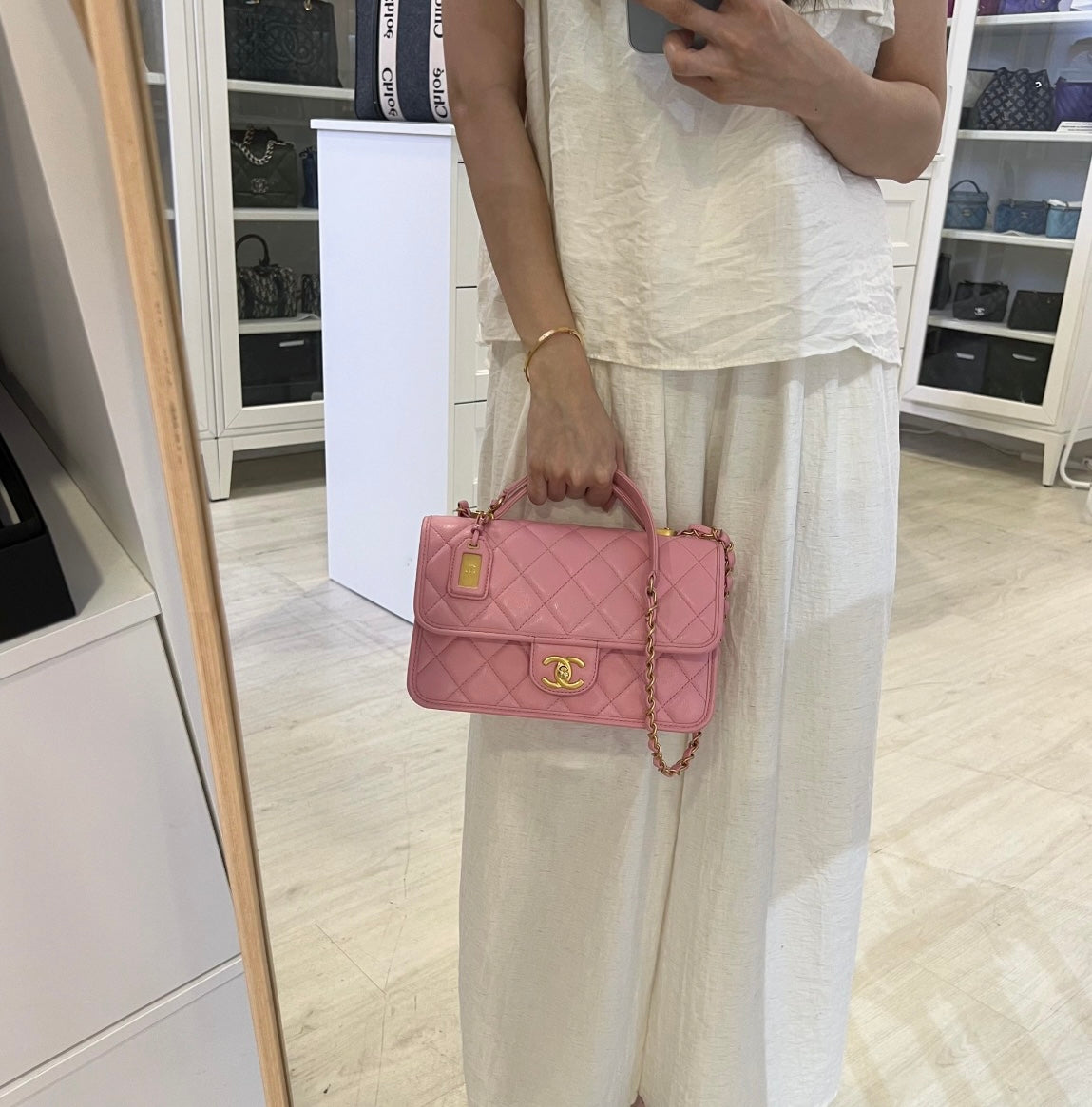 Chanel 22K Seasonal Flap with Top Handle in Pink Caviar and AGHW (Model: ) Handbag