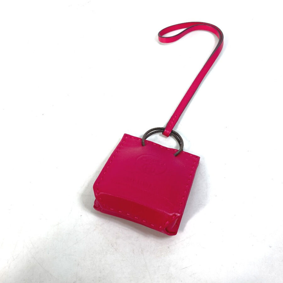 HERMES Bag charm Anyo Miro pink sack orange Women | Studio Nafay