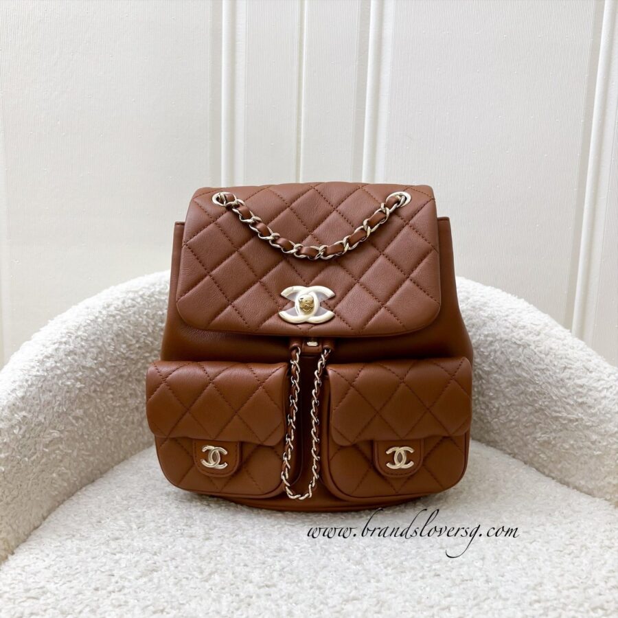 Chanel Medium Triple Backpack in 23A Cognac Brown Calfskin and LGHW (Model: ) | Studio Nafay