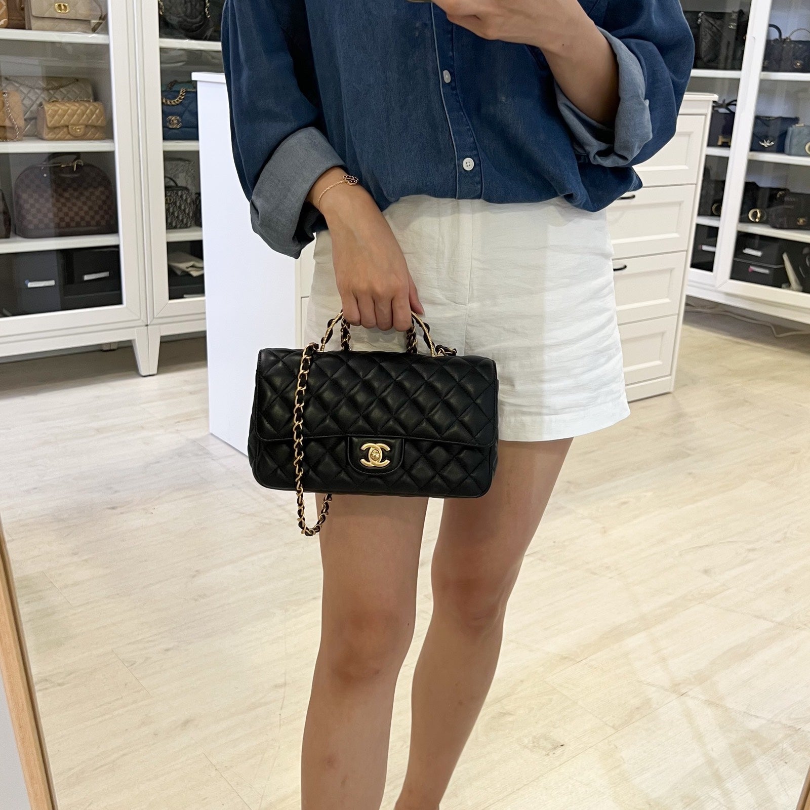 Chanel 23K Small Flap with Top Handle in Black Lambskin and AGHW (Model: ) Handbag