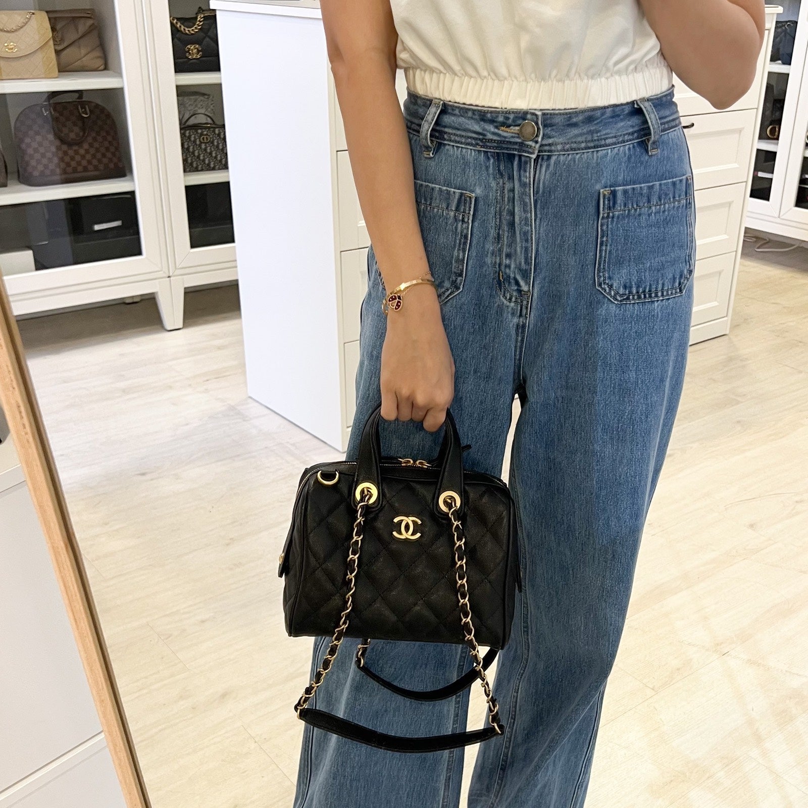 Chanel 25A Small Bowling Bag in Black Caviar and AGHW (Model: )