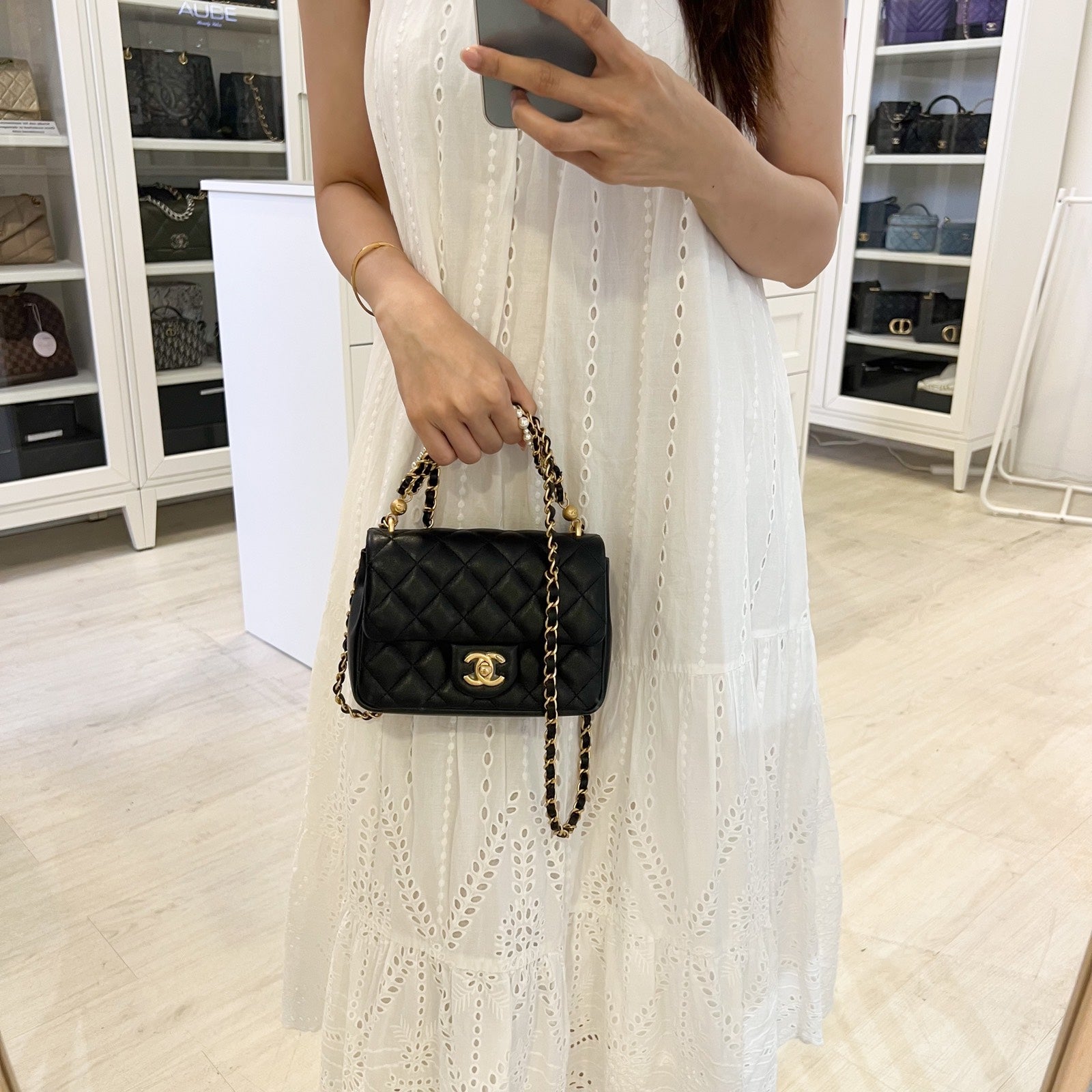 Chanel 24P Pearl Twist Chain Square Mini Flap Bag in Black Lambskin and AGHW (Model: )