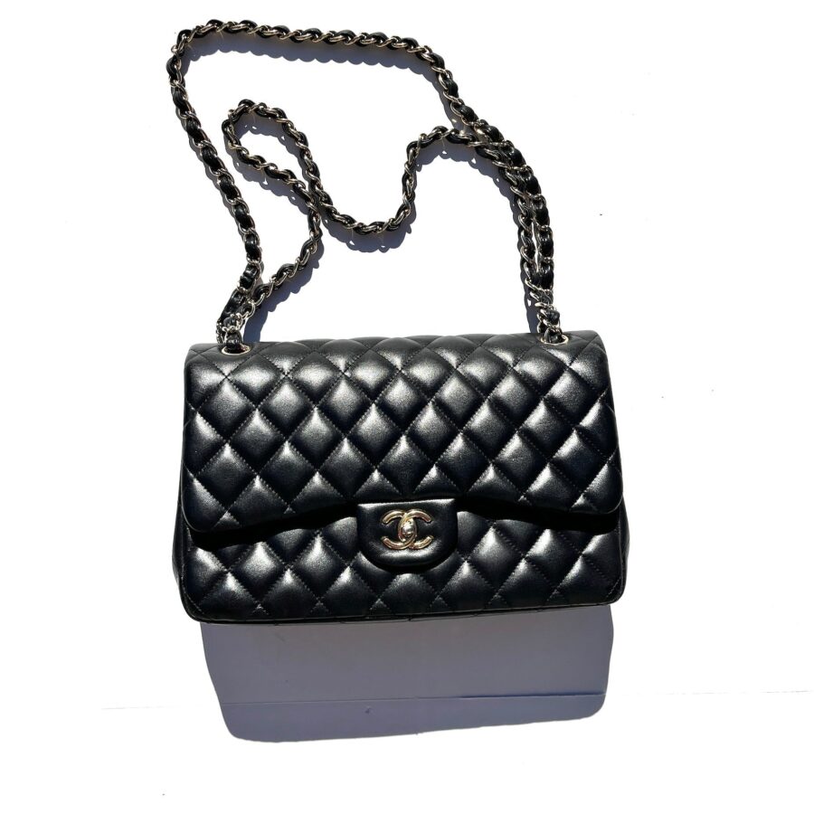 CHANEL Black Lambskin Jumbo Quilted Gold Hardware Classic Double Flap Bag | Studio Nafay