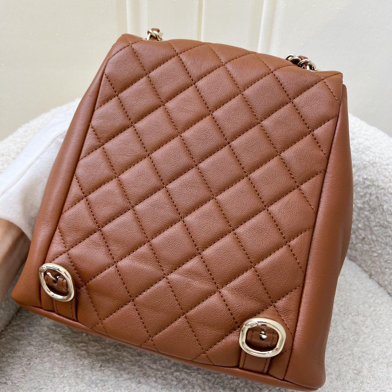 Chanel Medium Triple Backpack in 23A Cognac Brown Calfskin and LGHW (Model: )