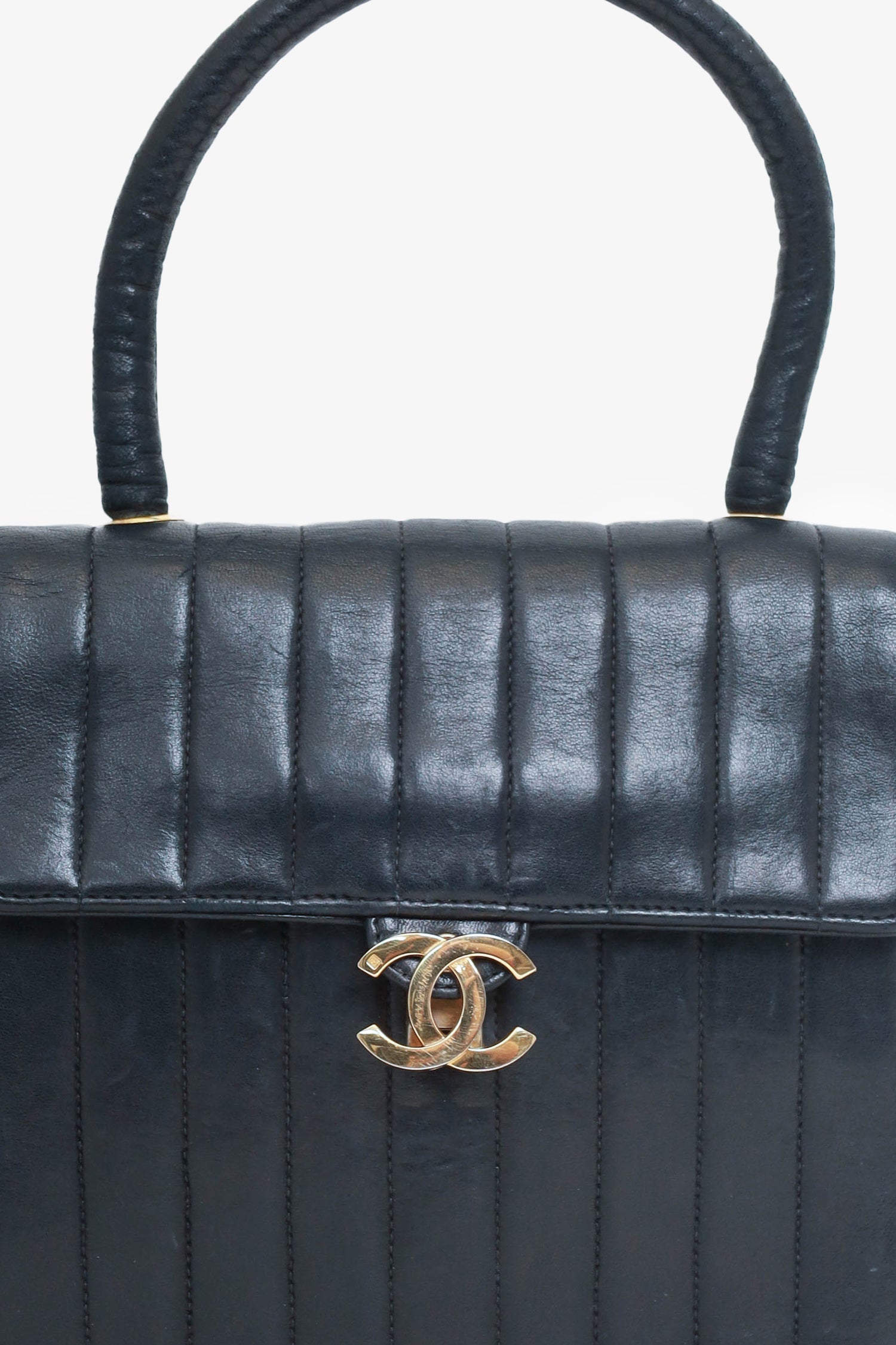 Chanel -94 Black Vertical Quilted Lambskin Top Handle Bag